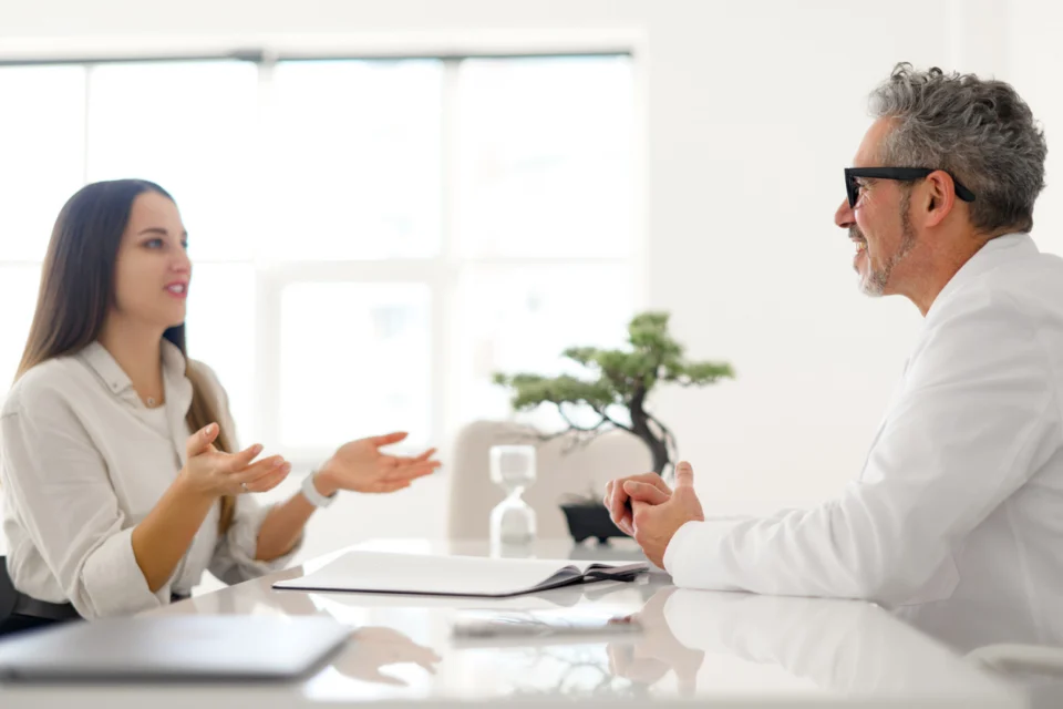 Patient speaking with a physician about regenerative wellness